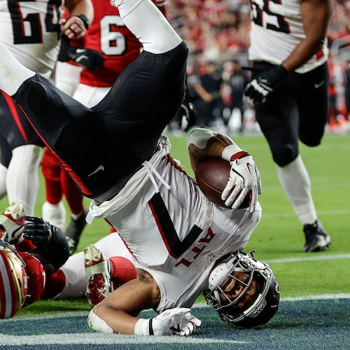 Atlanta Falcons running back Bijan Robinson scores a touchdown against the San Francisco 49ers in the second half of Sunday's game against the San Francisco 49ers. (Kelley L Cox/AP)