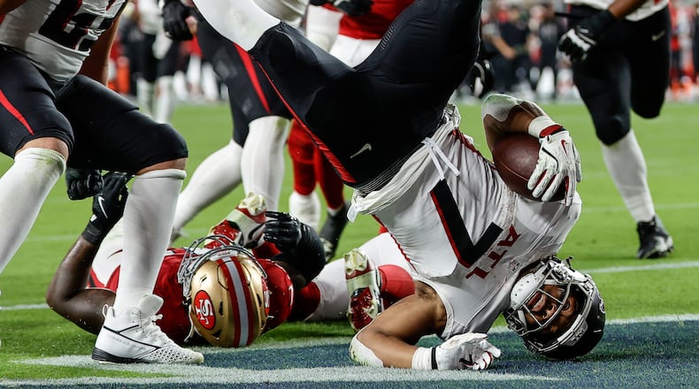 Atlanta Falcons running back Bijan Robinson scores a touchdown against the San Francisco 49ers in the second half of Sunday's game against the San Francisco 49ers. (Kelley L Cox/AP)