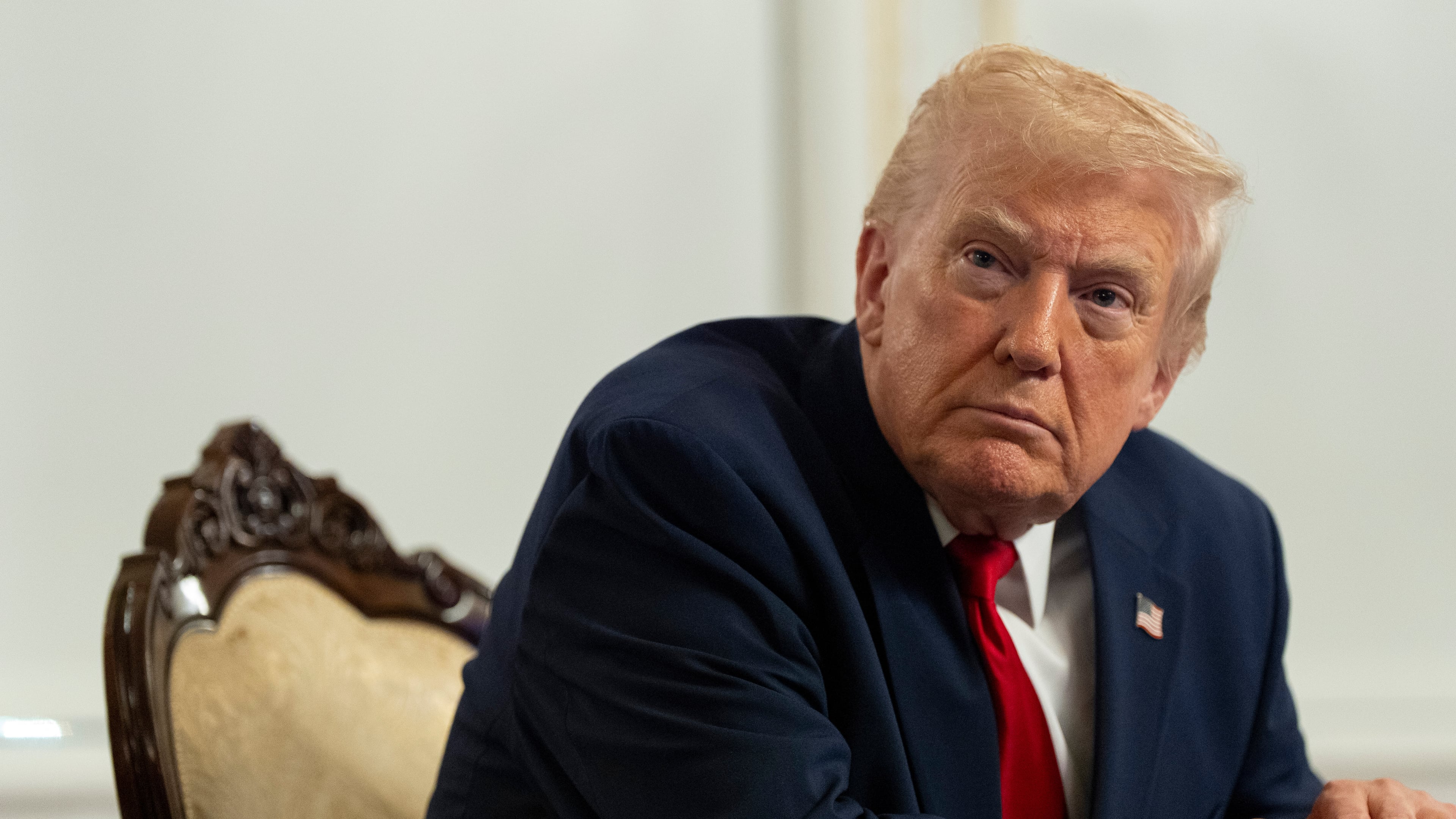 President Donald Trump speaks to reporters after speaking to troops via video from his Mar-a-Lago estate on Thanksgiving, Thursday, Nov. 27, 2025, in Palm Beach, Fla. (AP Photo/Alex Brandon)