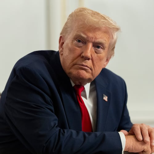 President Donald Trump speaks to reporters after speaking to troops via video from his Mar-a-Lago estate on Thanksgiving, Thursday, Nov. 27, 2025, in Palm Beach, Fla. (AP Photo/Alex Brandon)
