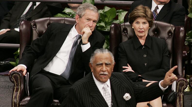 The Rev. Joseph Lowery speaks during the Coretta Scott King funeral ceremony in 2006 as President Bush and his wife Laura look on. (AP Photo/Pool, Jason Reed)