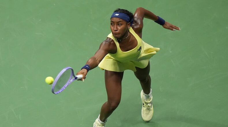 Coco Gauff, of the United States, returns the ball to Elena Rybakina, of Kazakhstan, during the women's singles semifinals of the U.S. Open tennis championships Thursday, Sept. 10, 2026, in New York. (AP Photo/Kirsty Wigglesworth)