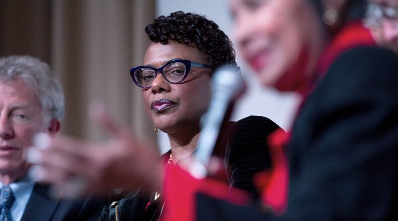 Bernice King listens to Xernona Clayton talk about her father during a panel discussion, honoring the 50-year anniversary of Martin Luther King’s assassination. The discussion took place at the Atlanta History Center’s McElreath Hall on Wednesday. STEVE SCHAEFER / FOR THE AJC
