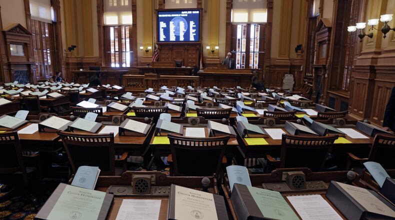 Binders filled with bills sit on senate desks before the session on Sine Die, the last day of the General Assembly in Atlanta on Monday, April 4, 2022. (Bob Andres / robert.andres@ajc.com)
