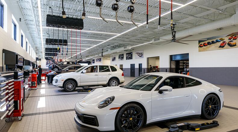 The first freestanding Porsche service center in the United
States has opened its doors near the busy Atlanta airport. The Porsche Service
Center South Atlanta, with 13 lift bays and a design focused on customer comfort
and convenience, is the first step of a multi-million dollar investment in new
features on the campus of Porsche Cars North America, Inc.
