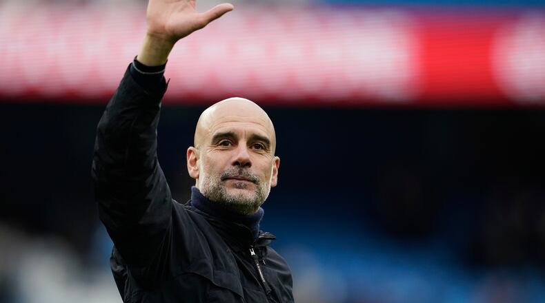 FILE - Manchester City's head coach Pep Guardiola greets fans at the end of the English Premier League soccer match between Manchester City and Brentford in Manchester, Saturday, May 9, 2026. (AP Photo/Dave Thompson, File)