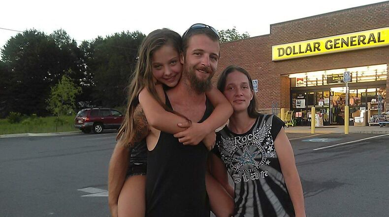 Summer Anderson, 13, was killed last week in a head-on crash with a Hall County School bus. Her father, Lonnie Anderson, center, is expected to face charges in the crash. April Anderson, Summer's mother, is also pictured.