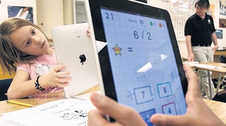 Students participate in Marietta City Schools’ math camp. The year’s classes start Aug. 3.