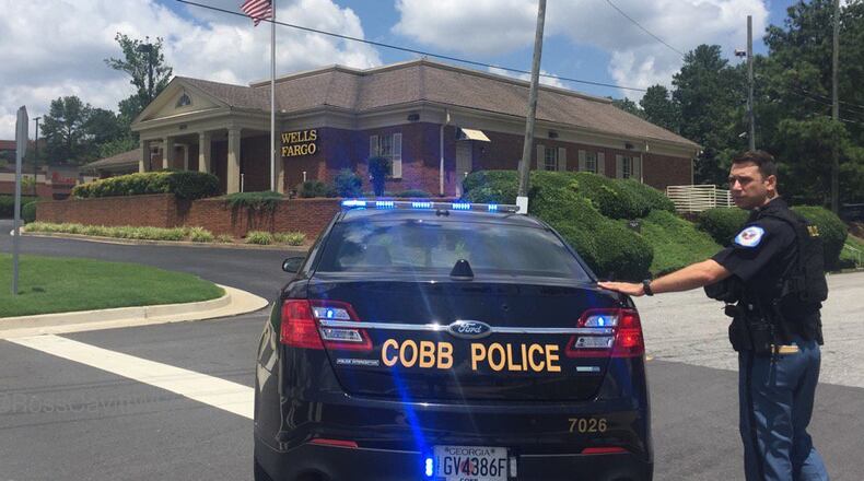 Authorities are investigating a bomb threat at the same Cobb bank that was the site of a deadly standoff earlier this month. (Credit: Channel 2 Action News)