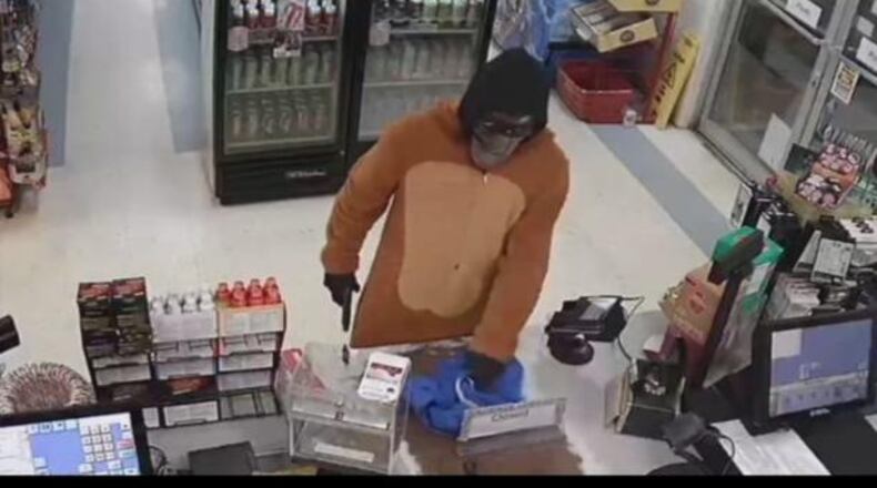 Video cameras caught a suspect wearing a mask and an animal onesie.
