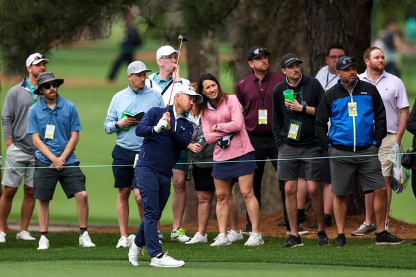 Brian Harman hits his second shot on the eighth fairway during the practice round of the 2024 Masters Tournament at Augusta National Golf Club, Tuesday, April 9, 2024, in Augusta, Ga. (Jason Getz / jason.getz@ajc.com)