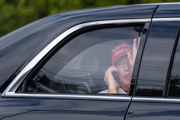 President Donald Trump waves as he arrives at the Trump International Golf Club, Friday, April 4, 2025, in West Palm Beach, Fla. (AP Photo/Alex Brandon)