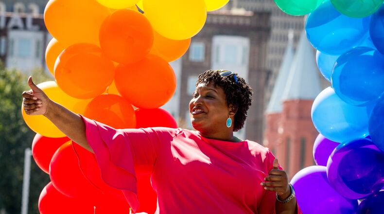 Gubernatorial candidate Stacey Abrams gives a thumbs up to the crowd during Atlanta Pride Parade Sunday in Atlanta October 14, 2018.  STEVE SCHAEFER / SPECIAL TO THE AJC