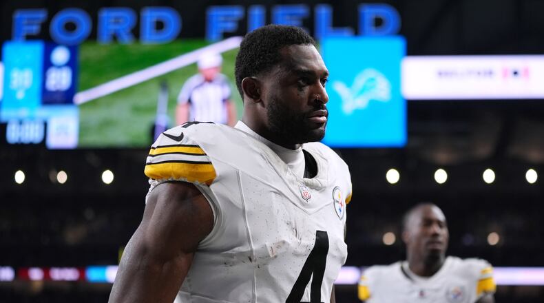 Pittsburgh Steelers' DK Metcalf walks off the field after an NFL football game against the Detroit Lions, Sunday, Dec. 21, 2025, in Detroit. (AP Photo/Ryan Sun)