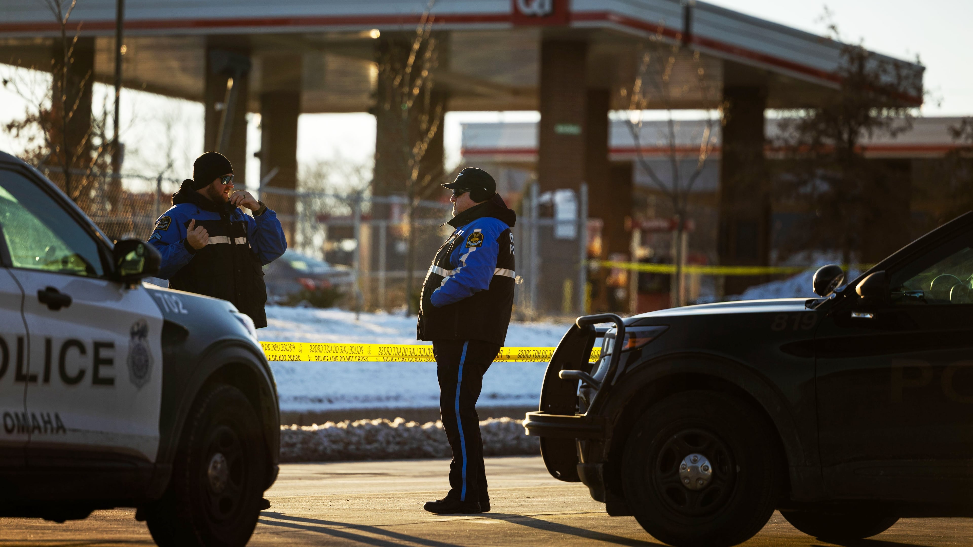 Omaha police investigate an incident at a QuikTrip gas station, that injured three officers and left the suspect dead in Omaha, Neb., Wednesday, Dec. 3, 2025. (Chris Machian/Omaha World-Herald via AP)