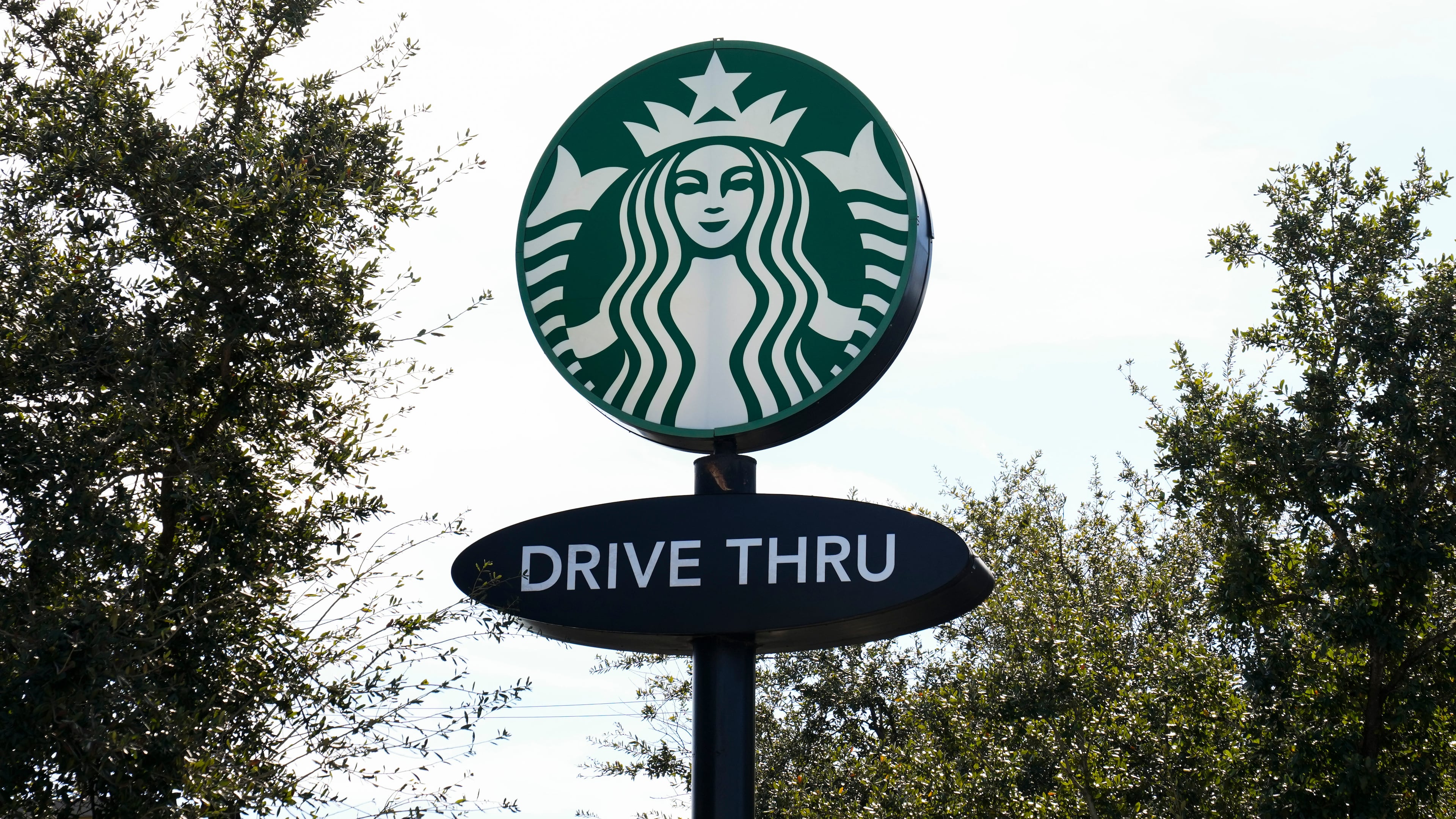 FILE - A Starbucks sign is seen on, Jan. 16, 2025, in Houston. (AP Photo/Ashley Landis, File)