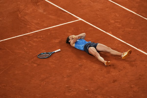 France's Lois Boisson celebrates as she won the quarterfinal match of the French Tennis Open against Russia's Mirra Andreeva at the Roland-Garros stadium in Paris, Wednesday, June 4, 2025. (AP Photo/Christophe Ena)