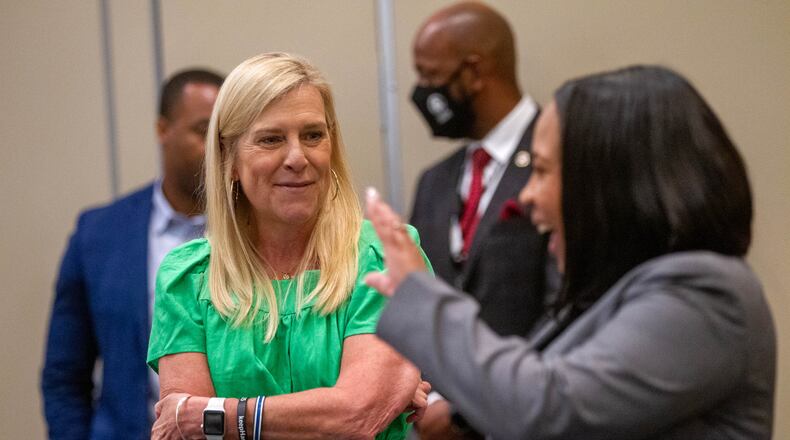 First Lady Marty Kemp talks with some of the guests before a luncheon focusing on the past and future human trafficking laws at the Georgia International Convention Center in College Park on Wednesday, May 12, 2021. (STEVE SCHAEFER FOR THE ATLANTA JOURNAL-CONSTITUTION)