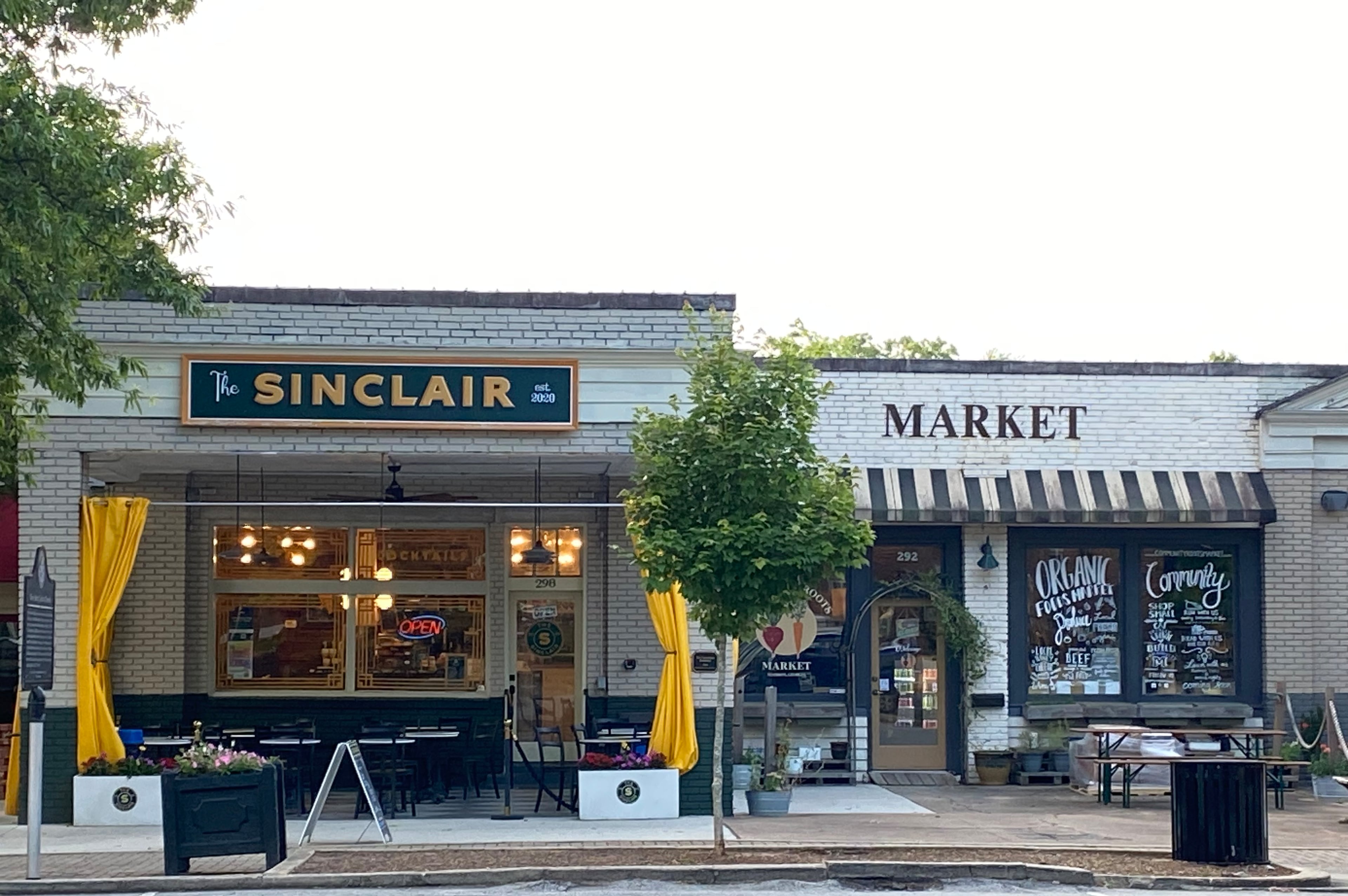Exterior of The Sinclair and Community Roots Market in Madison, Georgia.