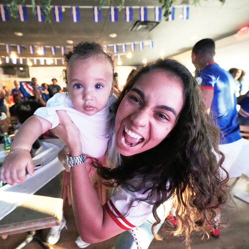 Cape Verde supporters celebrate their side's second goal as they watch the World Cup Group H soccer match between Uruguay and Cape Verde at a restaurant at a Cape Verde community in Brockton, Mass. near Boston, Sunday, June 21, 2026. (AP Photo/Martin Meissner)