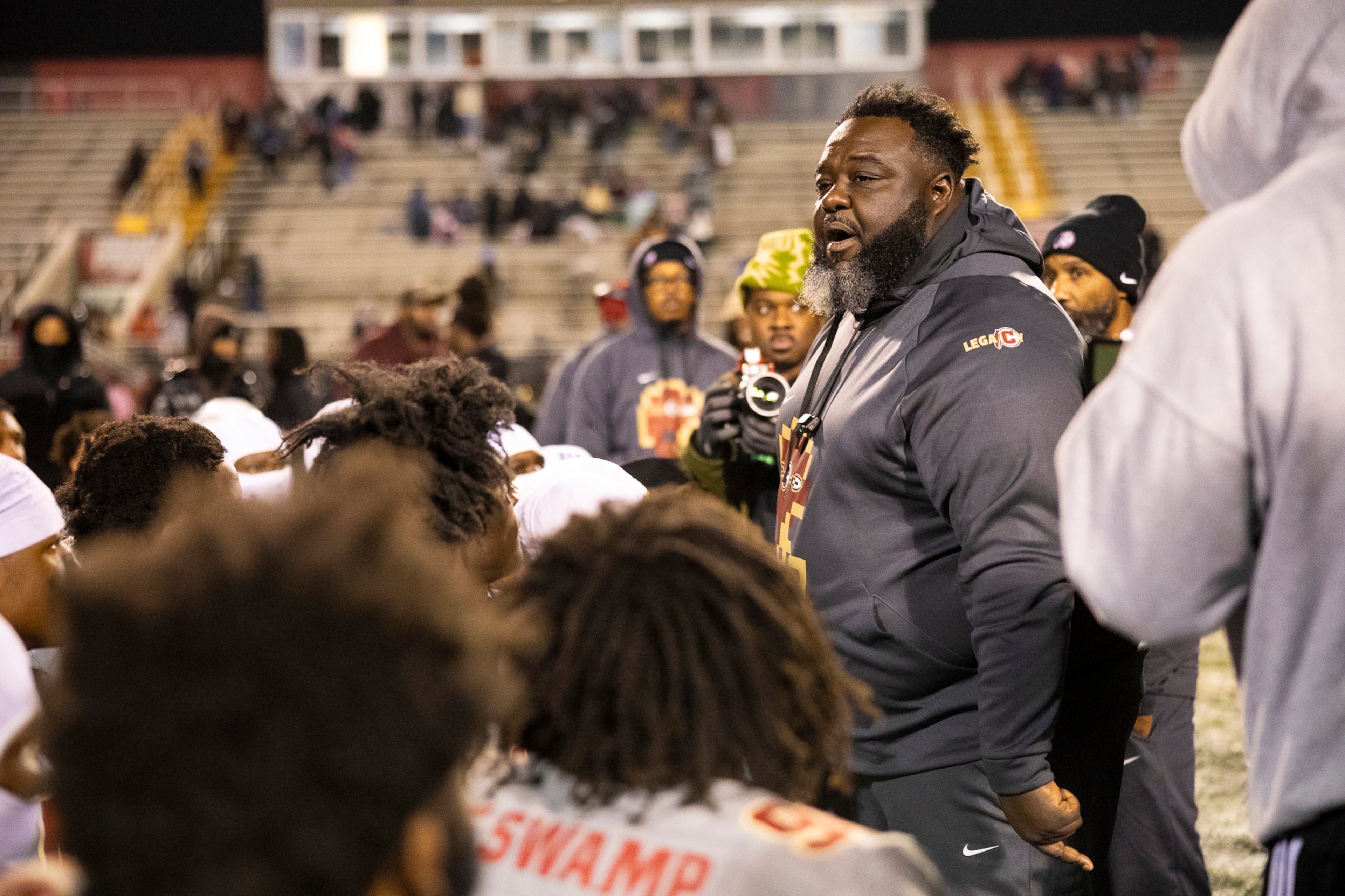 Creekside head coach Maurice Dixon motivates his team after a win in the class 4A semifinal against Kell at Creekside High School in Fairburn, GA on Friday, December 5, 2025. (Oscar Guevara Saenz for the AJC)