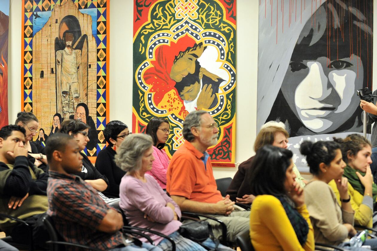 The audience listens to speakers during “Islamophobia: Voices from the Frontlines” at the Georgia Peace Center on Wednesday, Sept. 7, 2011, in Atlanta. (Hyosub Shin/AJC)
