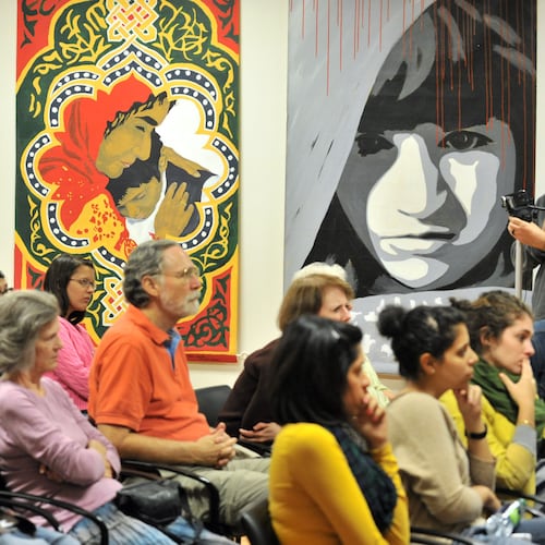 The audience listens to speakers during “Islamophobia: Voices from the Frontlines” at the Georgia Peace Center on Wednesday, Sept. 7, 2011, in Atlanta. (Hyosub Shin/AJC)