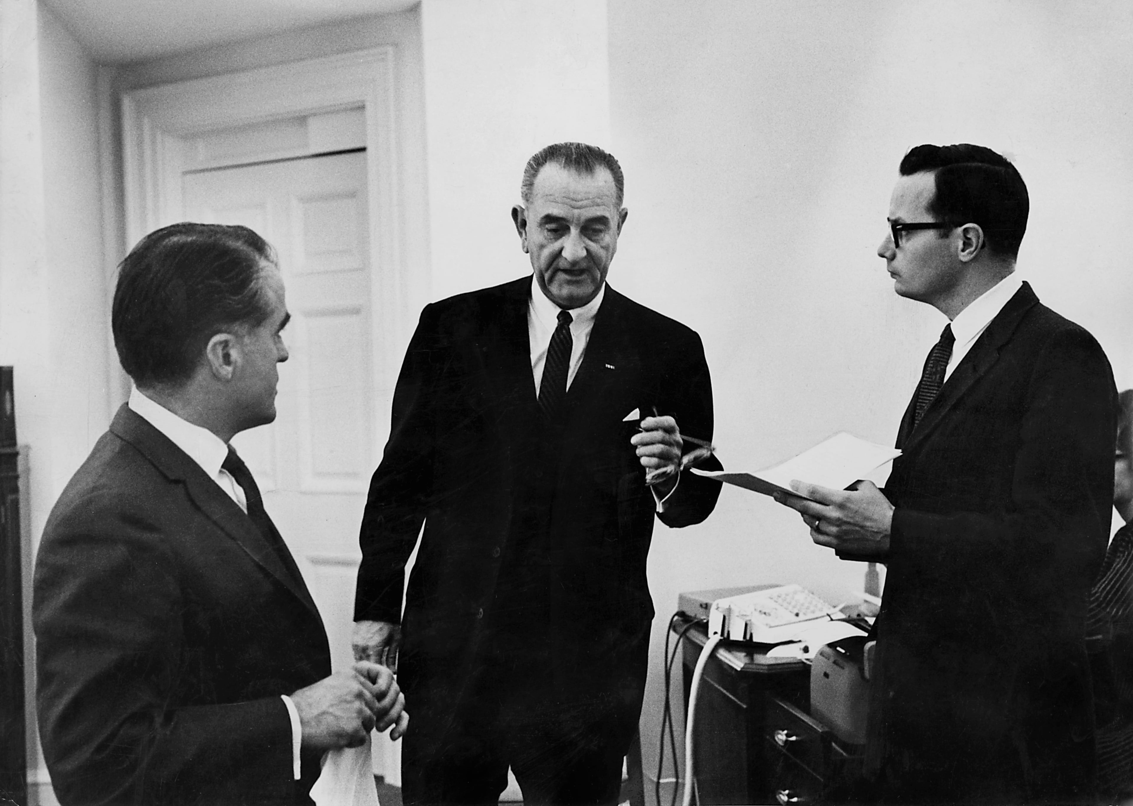 White House Press Secretary Bill Moyers (right) with President Lyndon Johnson and Jack Valenti (left) at the White House in December 1963. Johnson issued a proclamation in 1968 declaring Hispanic Heritage Week on Sept. 15. (George Tames/New York Times)