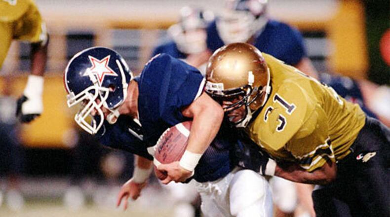 Jamal Lewis (31, right, vs. Dunwoody in 1995) gained 1,923 yards and scored 28 TDs as a junior.