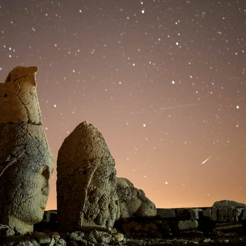 FILE - Ancient statues are seen during the Perseid meteor shower atop Mount Nemrut in southeastern Turkey, Sunday, Aug.11, 2024. (AP Photo/Emrah Gurel,File)