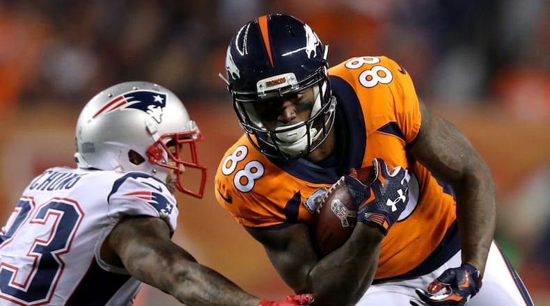 Demaryius Thomas #88 of the Denver Broncos carries the ball against Patrick Chung #23 of the New England Patriots at Sports Authority Field at Mile High on November 12, 2017 in Denver, Colorado. (Matthew Stockman/Getty Images/TNS)