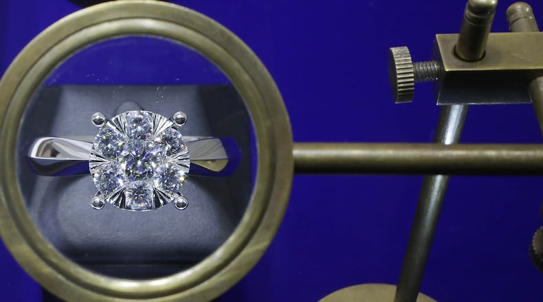 An Alaskan woman was pleasantly surprised when an honest restaurant worker found and returned a diamond that fell out of the woman's wedding ring.