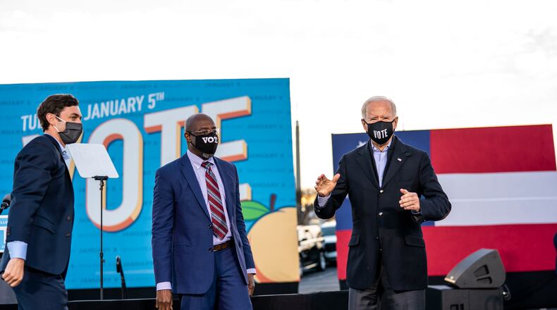 Jon Ossoff and the Rev. Raphael Warnock, Democratic Senate candidates, with President-elect Joe Biden at a rally in Atlanta, Jan. 4, 2021. Senate control opens up new possibilities for Democrats on health care, but the party will still need to contend with arcane rules and the challenges of a narrow majority. (Doug Mills/The New York Times)