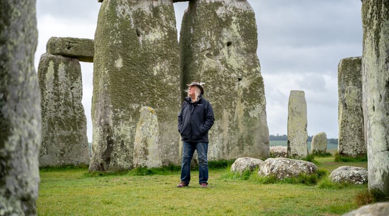 This photo provided by Wessex Archaeology shows archaeologist Phil Harding standing at Stonehenge in May 2026, near Salisbury, England. (Wessex Archaeology via AP)