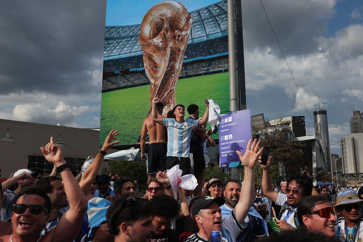 Argentina fans celebrate outside Atlanta Stadium (Mercedes-Benz Stadium) after Argentina wins the FIFA World Cup semifinal against England on July 15, 2026. It’s the last game Atlanta hosted. (Arvin Temkar/AJC)