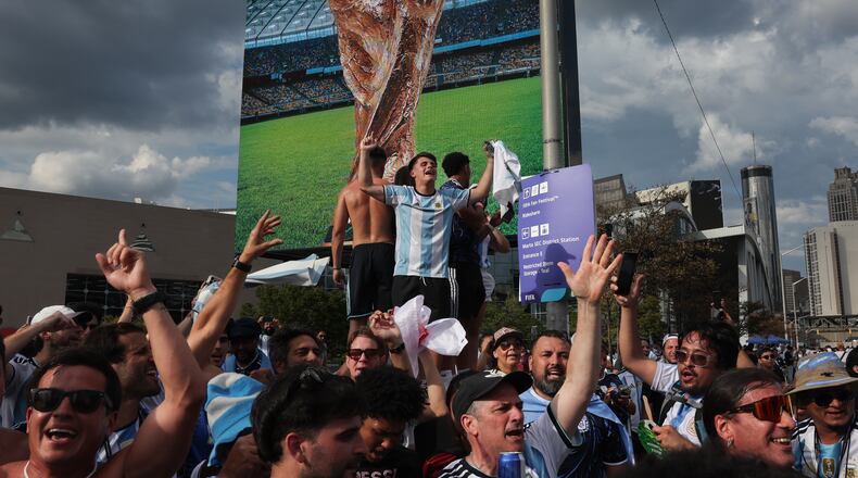 Argentina fans celebrate outside Atlanta Stadium (Mercedes-Benz Stadium) after Argentina wins the FIFA World Cup game against England on July 15, 2026. (Arvin Temkar/AJC)