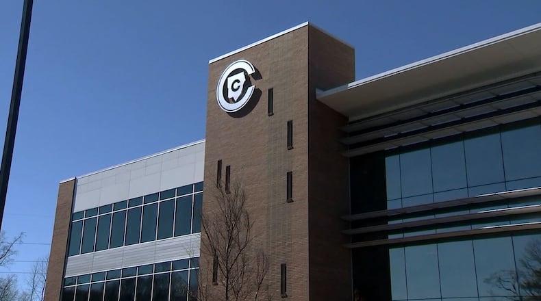 A Cobb County elementary school employee is accused of placing a camera in an elementary school bathroom.