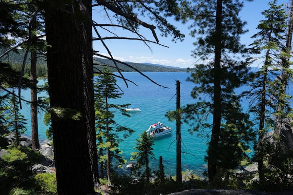 A boat carries visitors at D.L. Bliss State Park after a weekend incident in which a boat capsized, killing several people, on Monday, June 23, 2025, in Lake Tahoe, Calif. (AP Photo/Brooke Hess-Homeier)