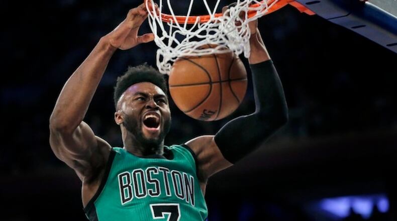 Boston Celtics' Jaylen Brown dunks during the second half of the NBA basketball game against the New York Knicks, Sunday, April 2, 2017, in New York. (AP Photo/Seth Wenig)