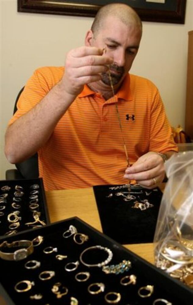 Downturn boosts business at pawn shops