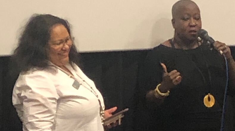 Iyabo Onipede, co-director of Compassionate Atlanta and Denitra Isler, a member of the cast of "Just Mercy," lead a discussion about the film following the fundraiser screening at AMC North DeKalb 16 Friday, Jan. 10. ARLINDA SMITH BROADY/AJC