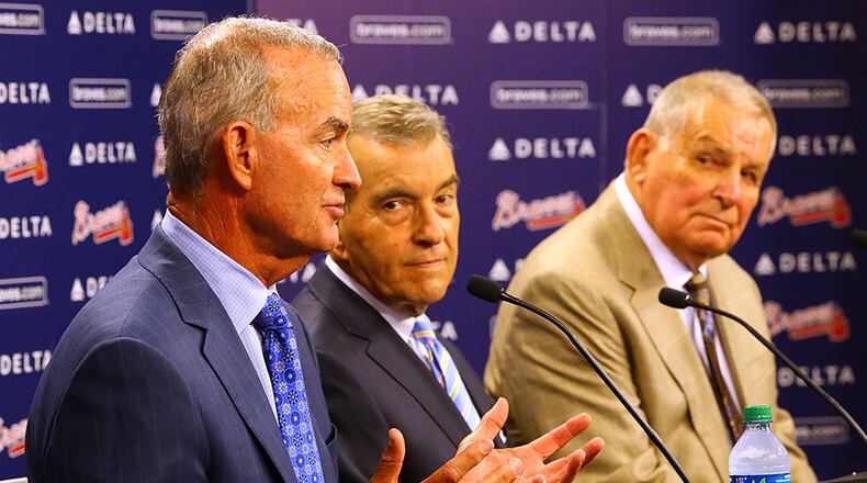 Braves interim General Manager John Hart (from left), President John Schuerholz, and longtime former manager Bobby Cox hold a press conference Monday, Sept. 22, 2014, after the team fired General Manager Frank Wren in Atlanta.