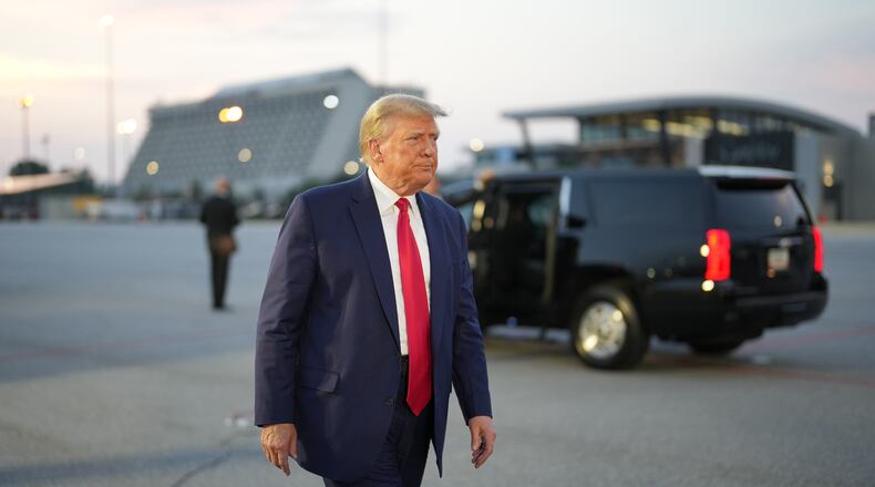 Donald Trump after speaking to reporters at Hartsfield-Jackson International Airport in Atlanta on Thursday, Aug. 24, 2023, where he turned himself in at the Fulton County Jail earlier in the evening. The former president will be booked on 13 state felony charges for his efforts to reverse his 2020 election loss in Georgia. (Doug Mills/The New York Times)