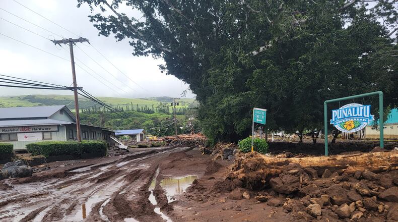 A roadway is washed out by mud on Monday, Aug. 17, 2026, in Naalehu, Hawaii, following heavy rains from Hurricane Lala. (Aina Akamu via AP)