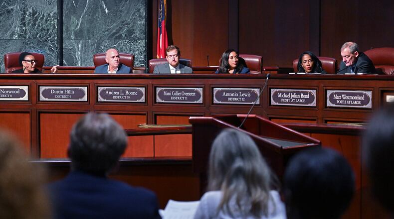 Chair woman Leah Ward Sears (left) confers with other task force members during the first meeting of a task force established to review the inspector general's authority at Atlanta City Hall, Tuesday, September 24, 2024, in Atlanta. The task force established to review the procedures of the Office of the Inspector General and Ethics Office met for the first time Tuesday. (Hyosub Shin / AJC)