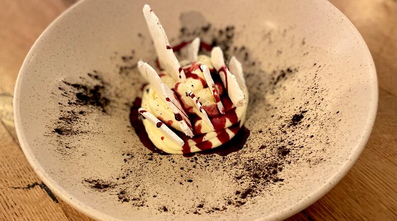 Deconstructed corn husk meringue is a savory-sweet dessert served at Oaxaca. Angela Hansberger for The Atlanta Journal-Constitution