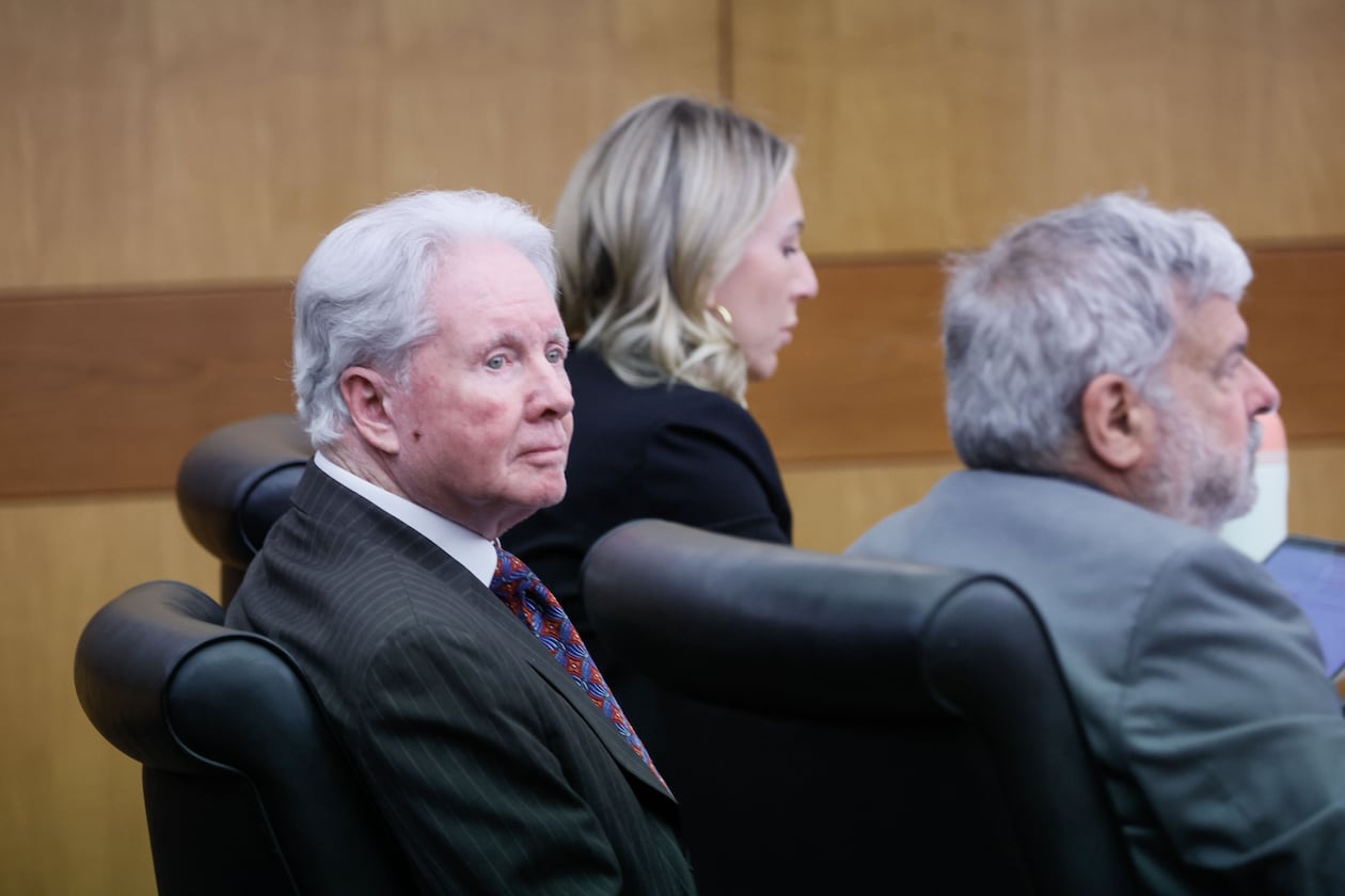 Claud “Tex” McIver (center) during the first day of jury selection in his December retrial that was promptly put on hold pending the state's appeal of an order restricting its evidence. The 81-year-old former attorney pleaded guilty Friday to a charge of involuntary manslaughter.
Miguel Martinez /miguel.martinezjimenez@ajc.com