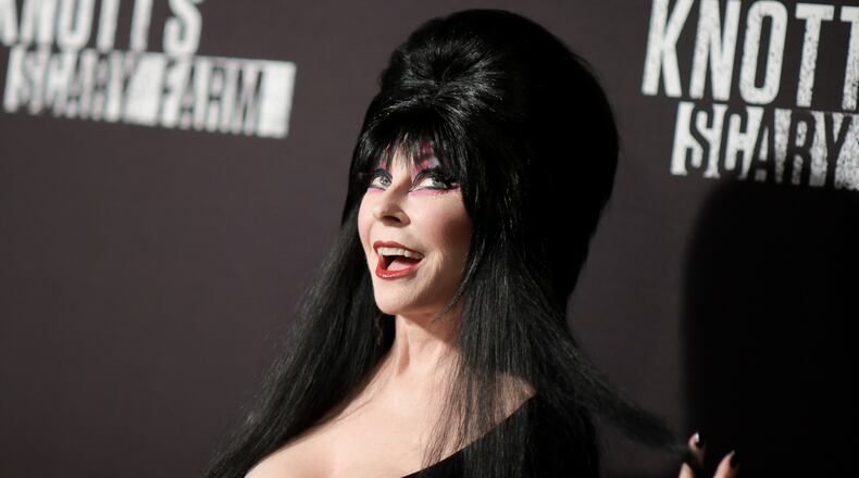 FILE - Cassandra Peterson appears at the 2016 Knott's Scary Farm Black Carpet Event at Knott's Berry Farm in Buena Park, Calif., on Sept. 30, 2016, (Photo by Richard Shotwell/Invision/AP, File)
