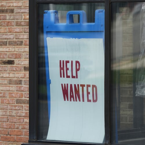 FILE - "Help Wanted" sign is displayed at a dry cleaner in Rolling Meadows, Ill., Thursday, May 15, 2025. (AP Photo/Nam Y. Huh, file)