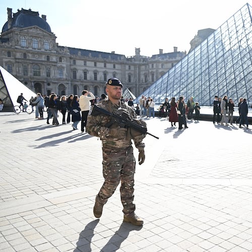 A soldier patrols in courtyard of the Louvre museum, Thursday, Oct. 30, 2025 in Paris. (AP Photo/Emma Da Silva)